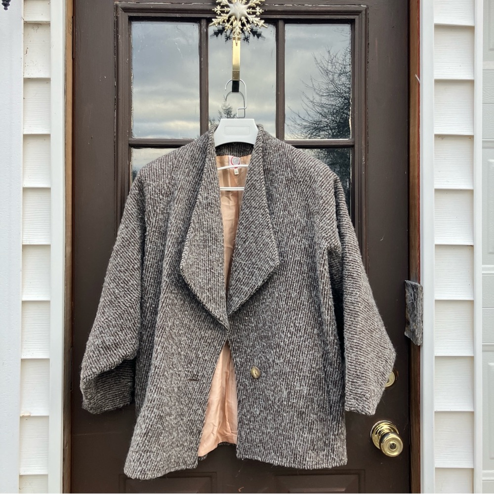 Vintage Italian woman’s sweater in a shawl style.